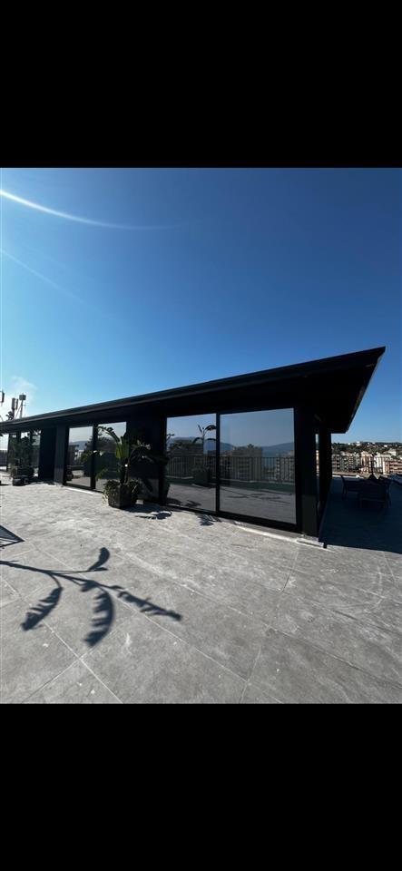 Shitet Penthouse tek stadiumi Flamurtari