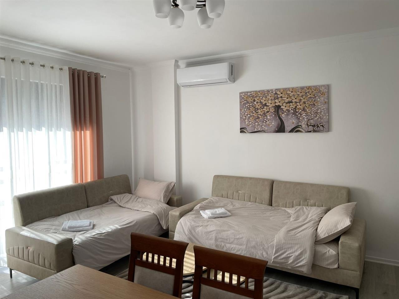 Apartament me qira ditore